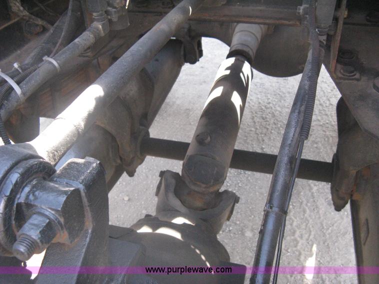 image for item G8281 2005 Kenworth T800 semi truck with knuckle boom crane and winch