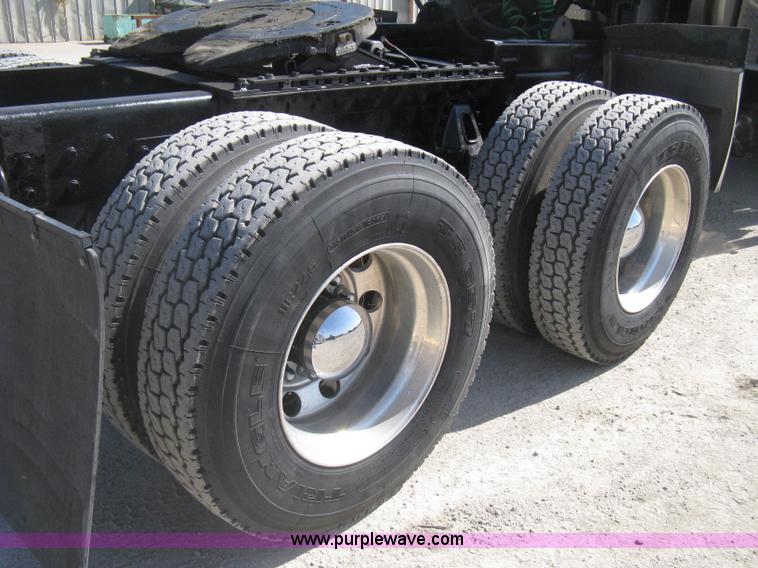 image for item G8281 2005 Kenworth T800 semi truck with knuckle boom crane and winch