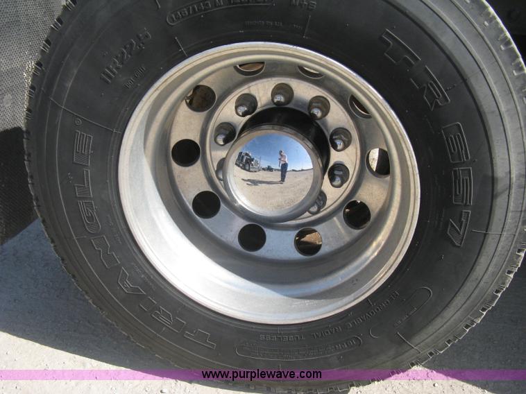 image for item G8281 2005 Kenworth T800 semi truck with knuckle boom crane and winch