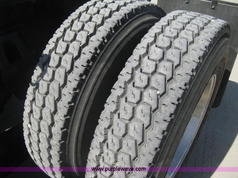 image for item G8281 2005 Kenworth T800 semi truck with knuckle boom crane and winch