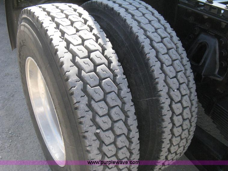 image for item G8281 2005 Kenworth T800 semi truck with knuckle boom crane and winch