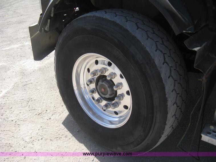 image for item G8281 2005 Kenworth T800 semi truck with knuckle boom crane and winch