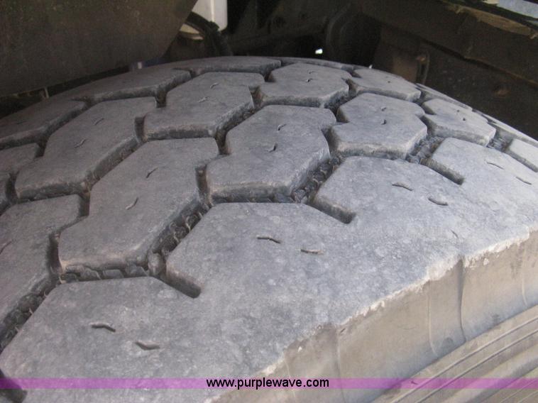 image for item G8281 2005 Kenworth T800 semi truck with knuckle boom crane and winch