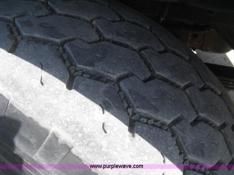 image for item G8281 2005 Kenworth T800 semi truck with knuckle boom crane and winch