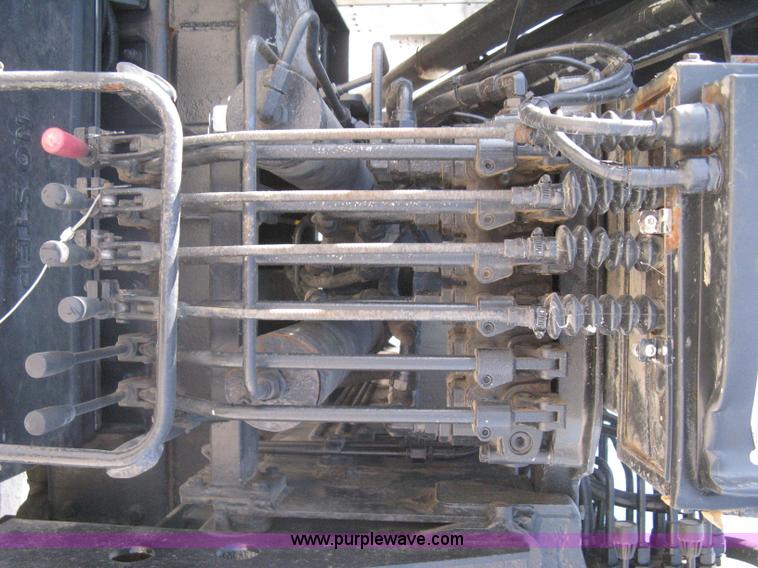 image for item G8281 2005 Kenworth T800 semi truck with knuckle boom crane and winch