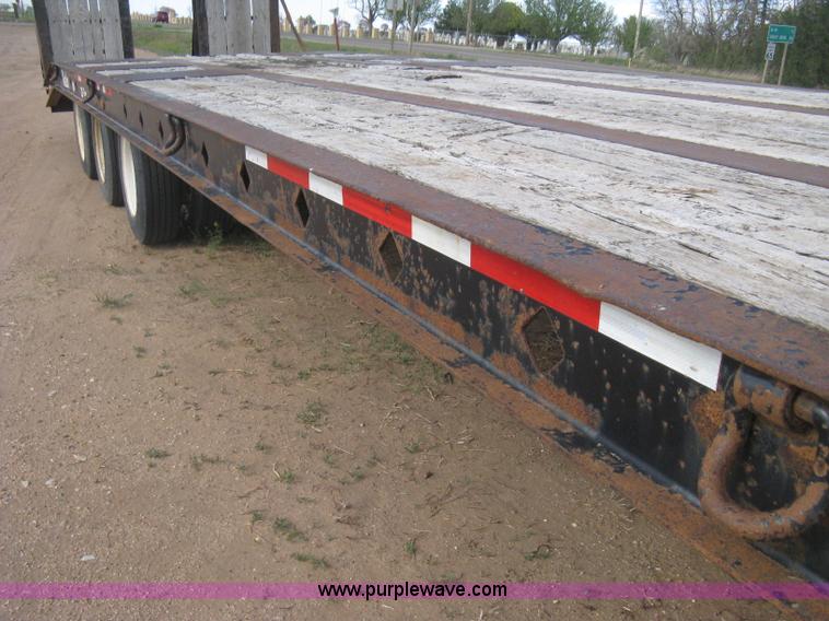 image for item G8290 2007 Winston flatbed equipment trailer
