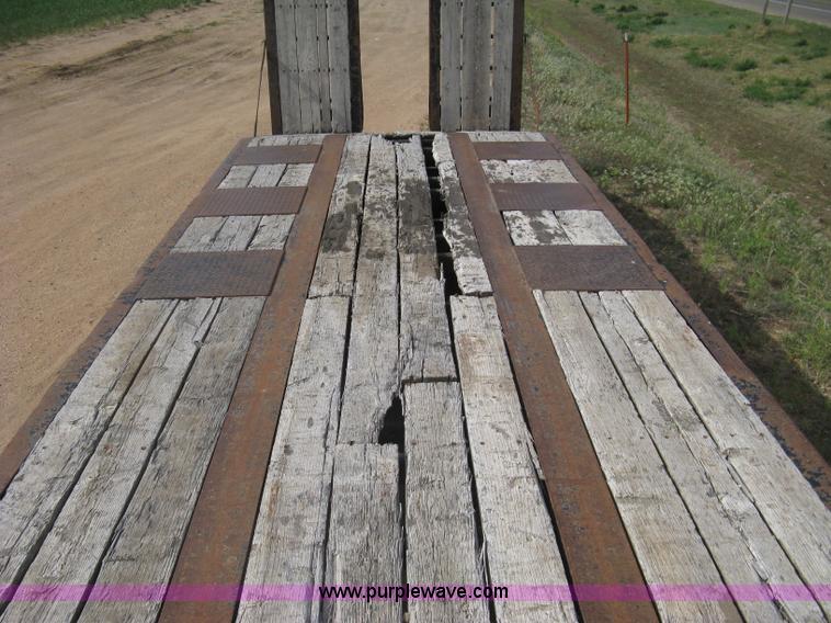 image for item G8290 2007 Winston flatbed equipment trailer