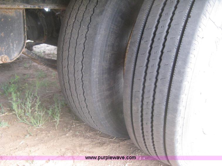 image for item G8290 2007 Winston flatbed equipment trailer