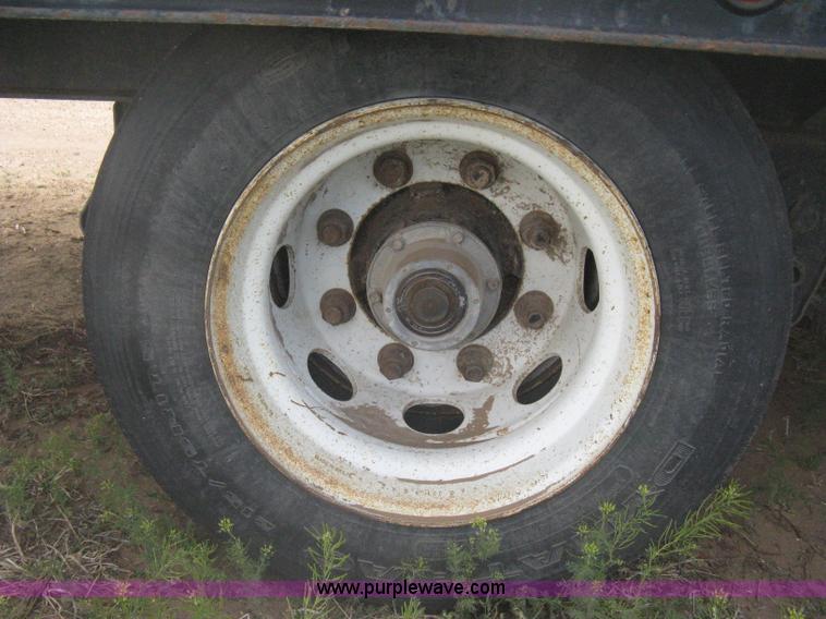 image for item G8290 2007 Winston flatbed equipment trailer