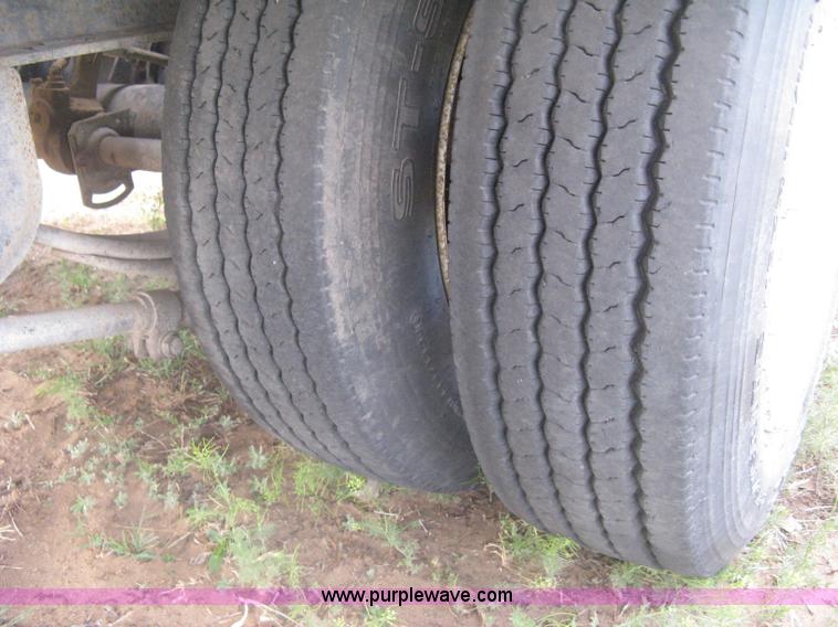 image for item G8290 2007 Winston flatbed equipment trailer