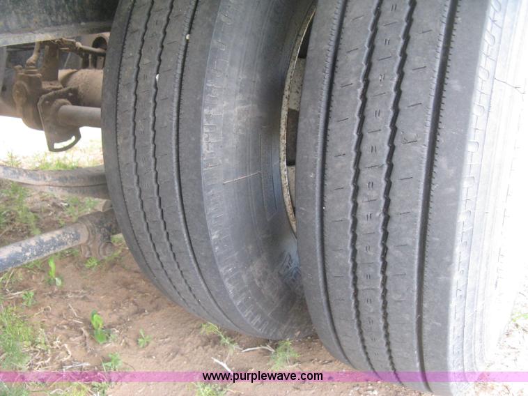 image for item G8290 2007 Winston flatbed equipment trailer