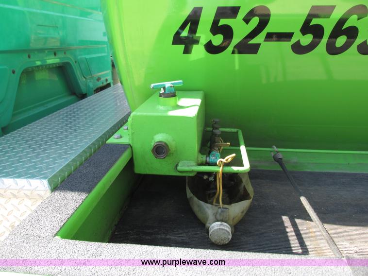 image for item G8773 1994 Freightliner FL60 vacuum truck