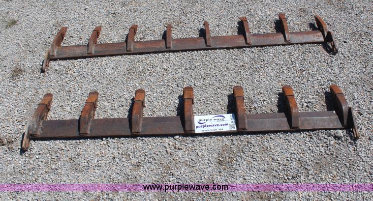 image for item H2637 (2) skid steer tooth bars