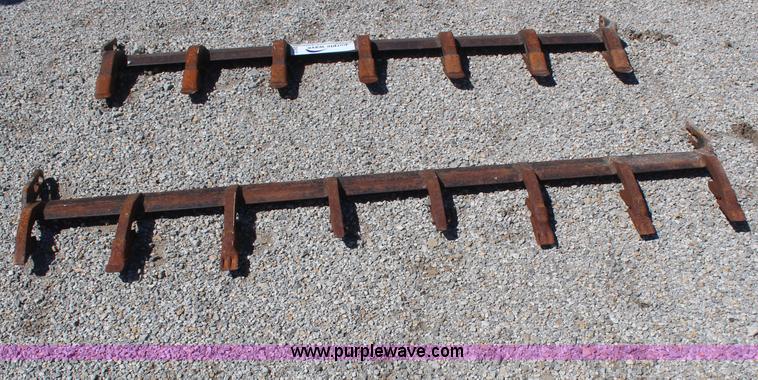 image for item H2637 (2) skid steer tooth bars