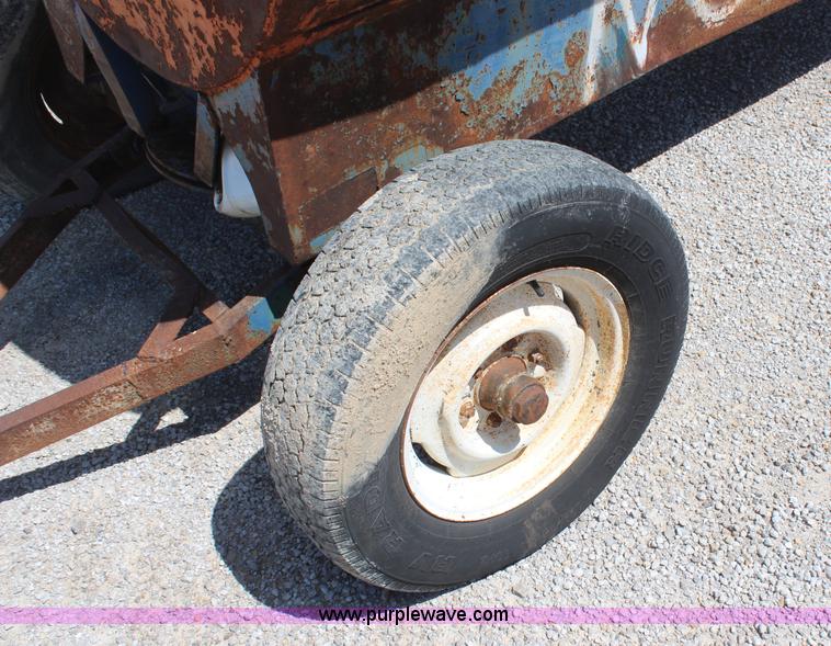 image for item H2638 1,000 gallon fuel tank on running gear