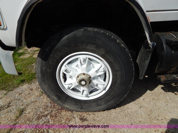 image for item H3433 1995 Ford L9000 roll off truck