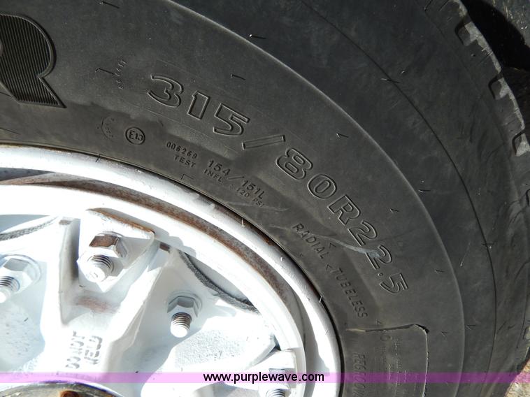 image for item H3433 1995 Ford L9000 roll off truck