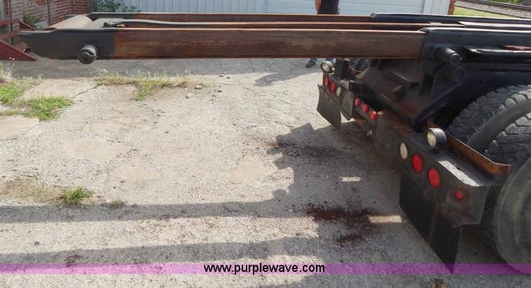 image for item H3433 1995 Ford L9000 roll off truck