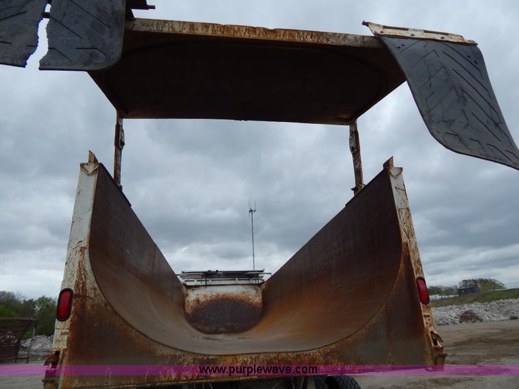 image for item H3440 1996 West barrel end dump trailer