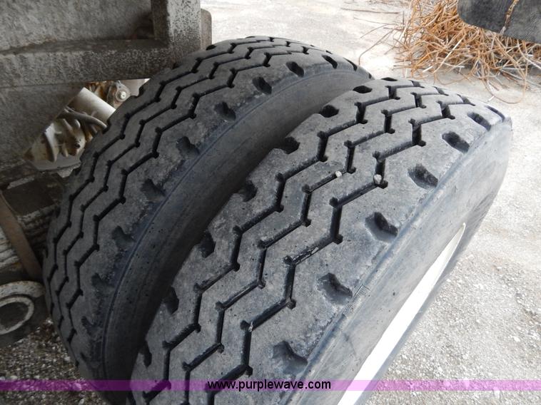 image for item H3440 1996 West barrel end dump trailer