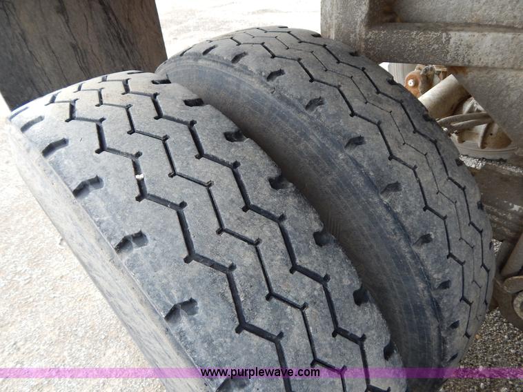 image for item H3440 1996 West barrel end dump trailer