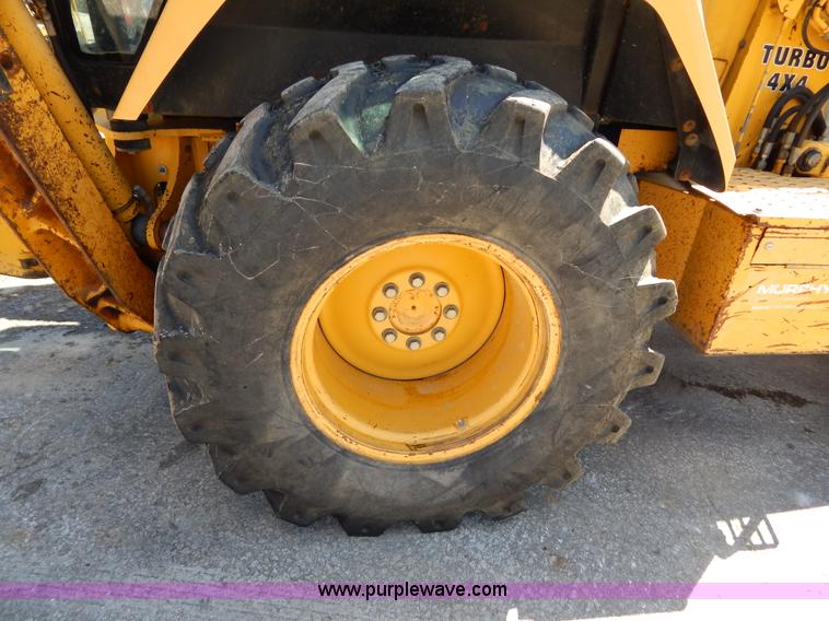 image for item H3444 1995 John Deere 410D backhoe