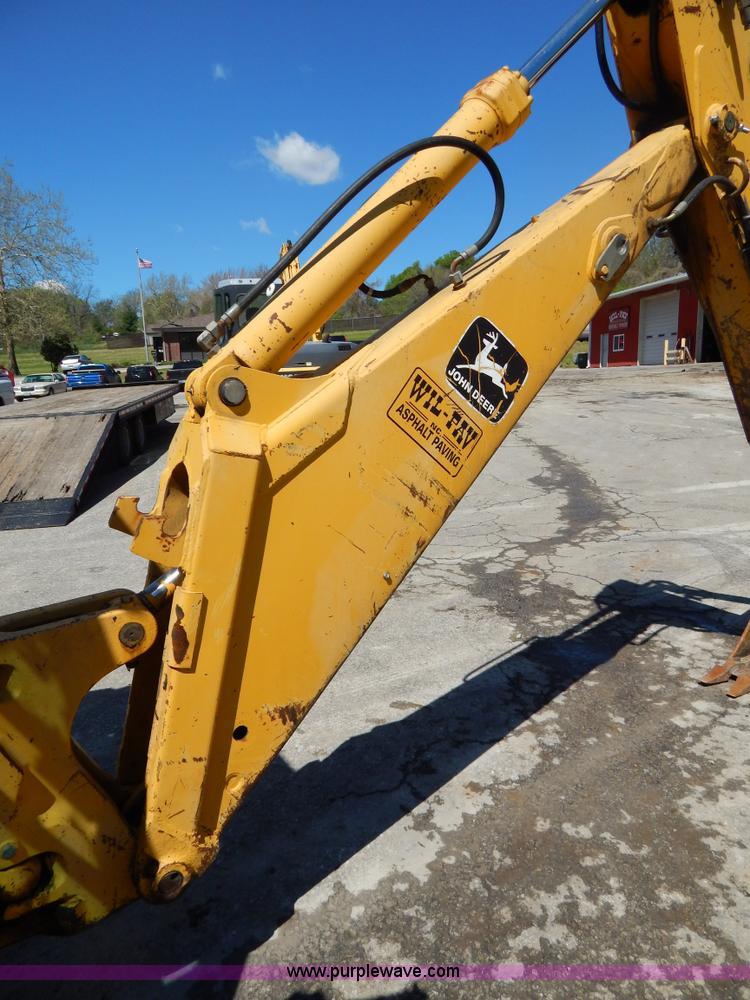 image for item H3444 1995 John Deere 410D backhoe