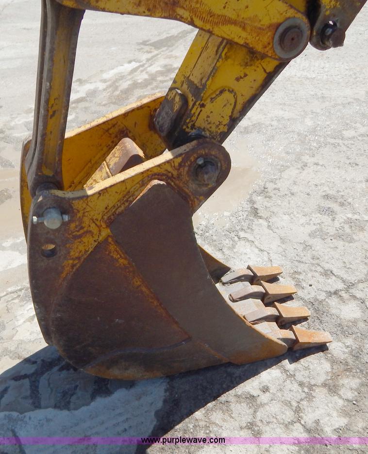 image for item H3444 1995 John Deere 410D backhoe