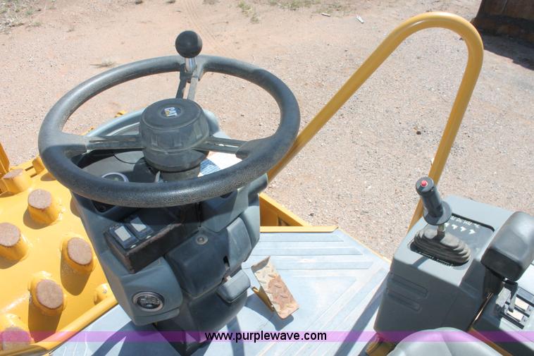 image for item H5675 2003 Caterpillar CP-433E vibratory padfoot compactor