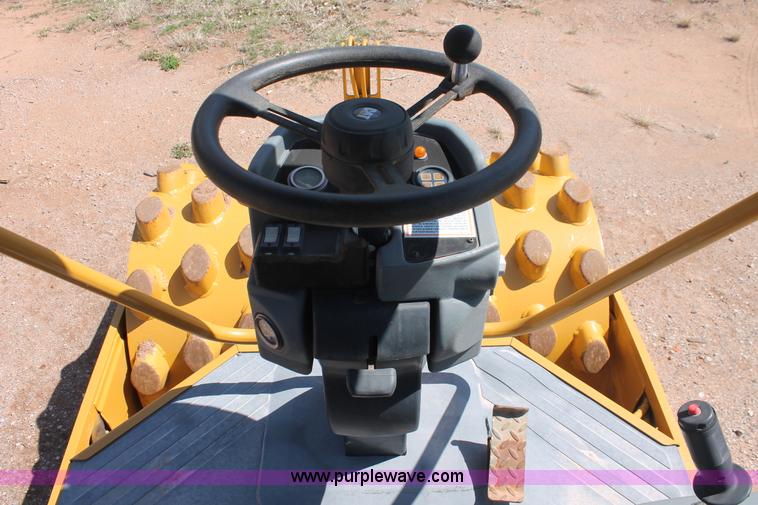image for item H5675 2003 Caterpillar CP-433E vibratory padfoot compactor