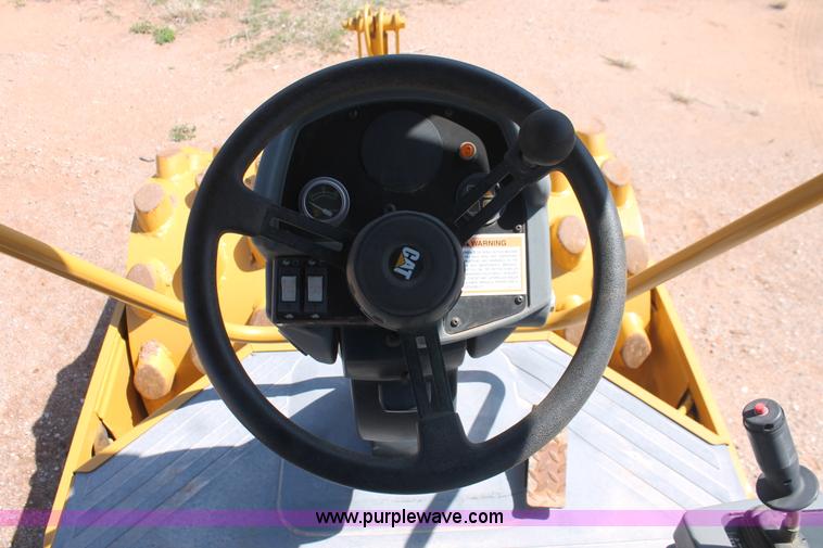 image for item H5675 2003 Caterpillar CP-433E vibratory padfoot compactor
