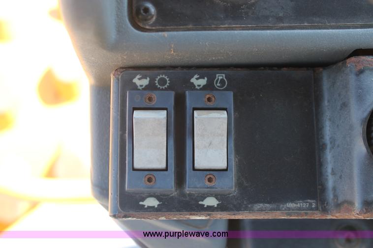 image for item H5675 2003 Caterpillar CP-433E vibratory padfoot compactor