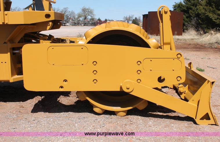 image for item H5675 2003 Caterpillar CP-433E vibratory padfoot compactor