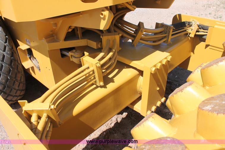 image for item H5675 2003 Caterpillar CP-433E vibratory padfoot compactor