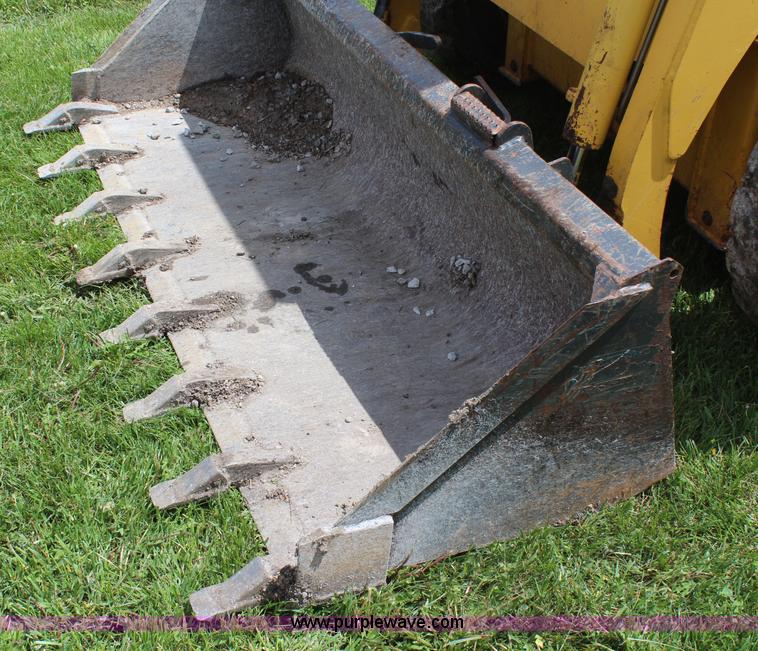 image for item H6117 2006 Komatsu SK1020-5N skid steer