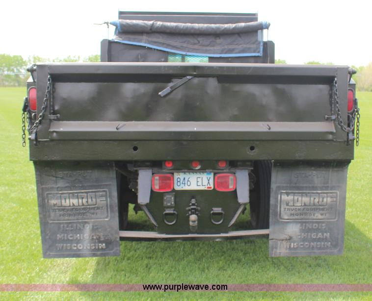 image for item H6122 2003 Chevrolet C4500 Crew Cab dump truck