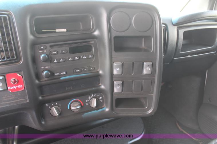 image for item H6122 2003 Chevrolet C4500 Crew Cab dump truck