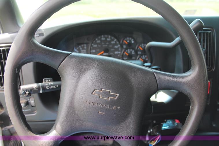 image for item H6122 2003 Chevrolet C4500 Crew Cab dump truck