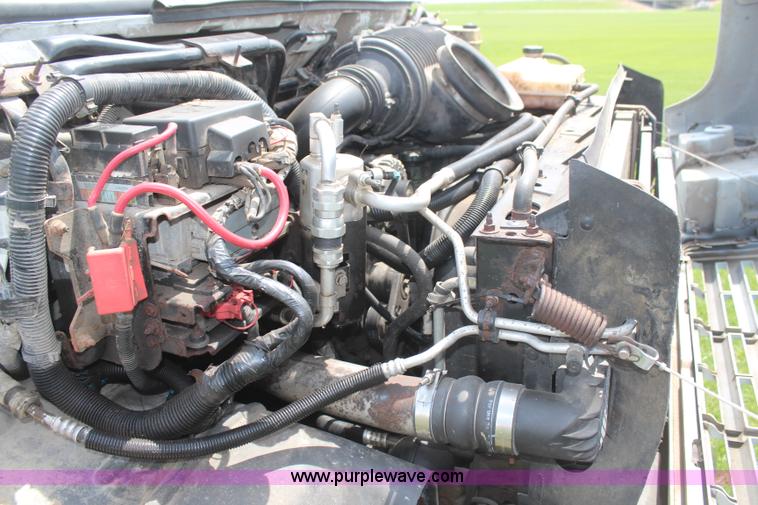 image for item H6122 2003 Chevrolet C4500 Crew Cab dump truck