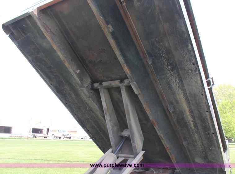 image for item H6122 2003 Chevrolet C4500 Crew Cab dump truck