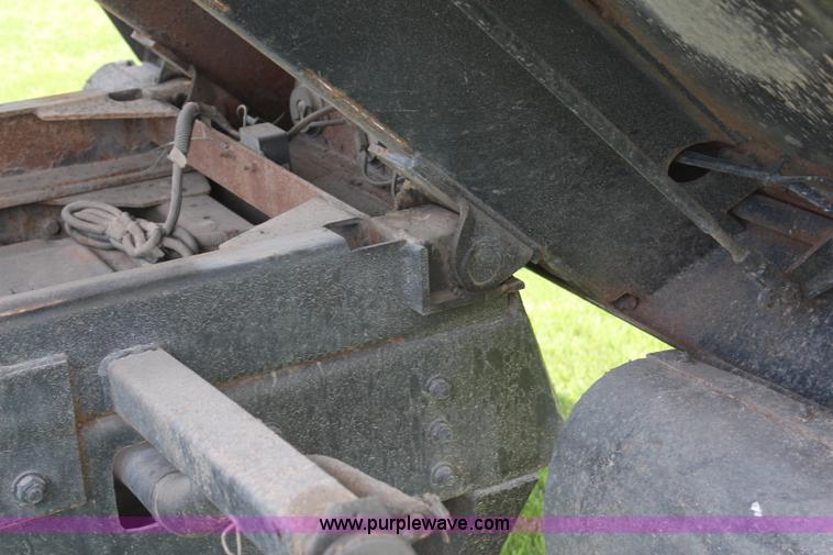 image for item H6122 2003 Chevrolet C4500 Crew Cab dump truck