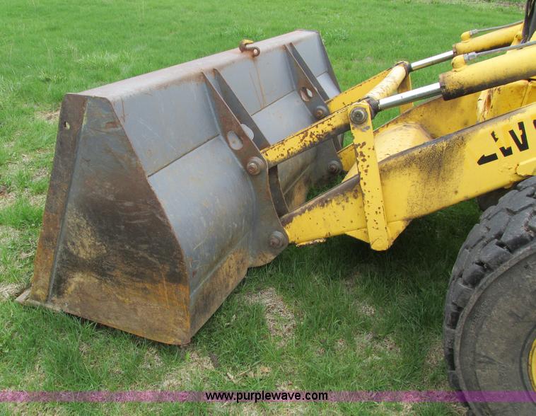 image for item E4713 2000 New Holland 575E backhoe