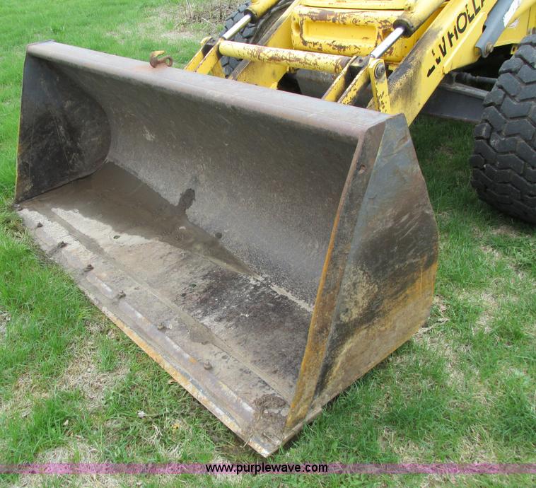 image for item E4713 2000 New Holland 575E backhoe
