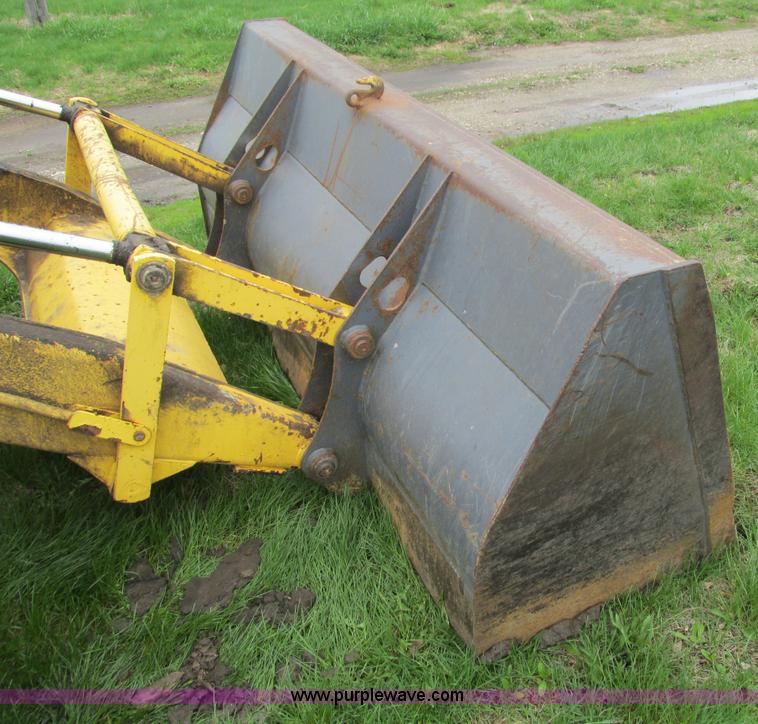 image for item E4713 2000 New Holland 575E backhoe