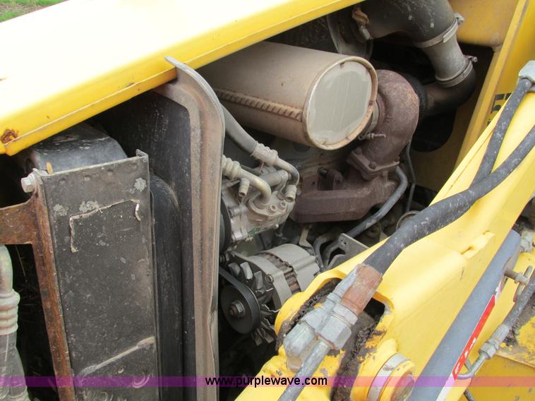 image for item E4713 2000 New Holland 575E backhoe