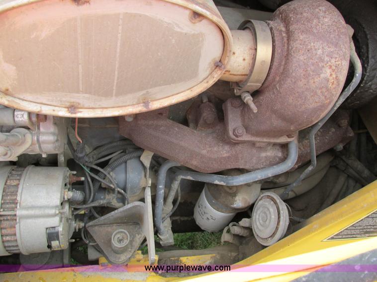 image for item E4713 2000 New Holland 575E backhoe