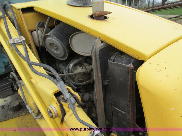 image for item E4713 2000 New Holland 575E backhoe