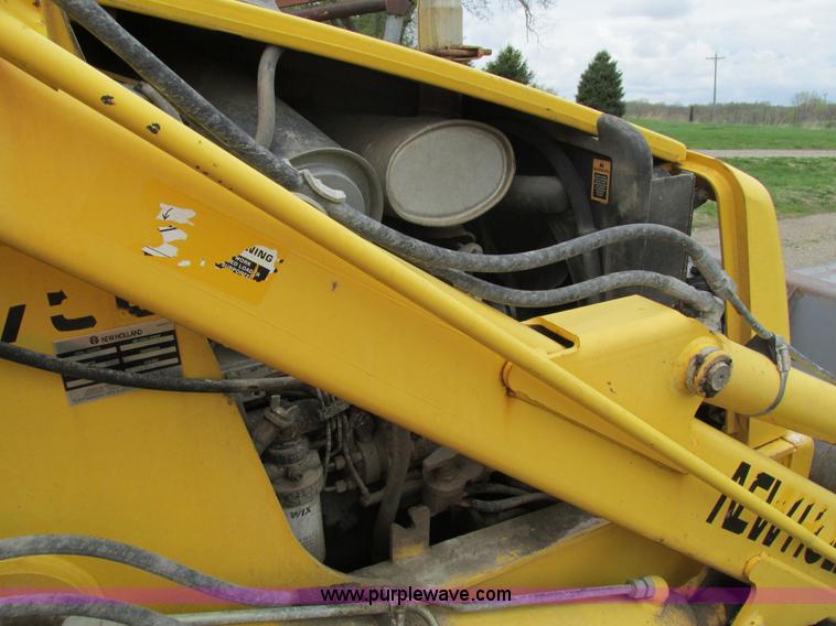 image for item E4713 2000 New Holland 575E backhoe