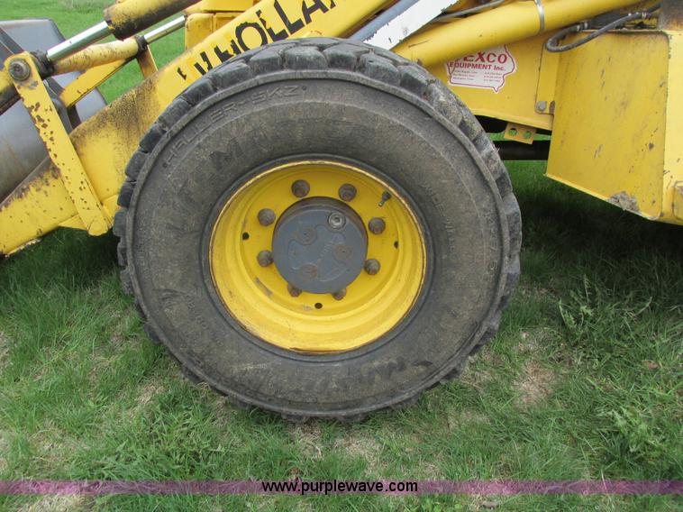 image for item E4713 2000 New Holland 575E backhoe