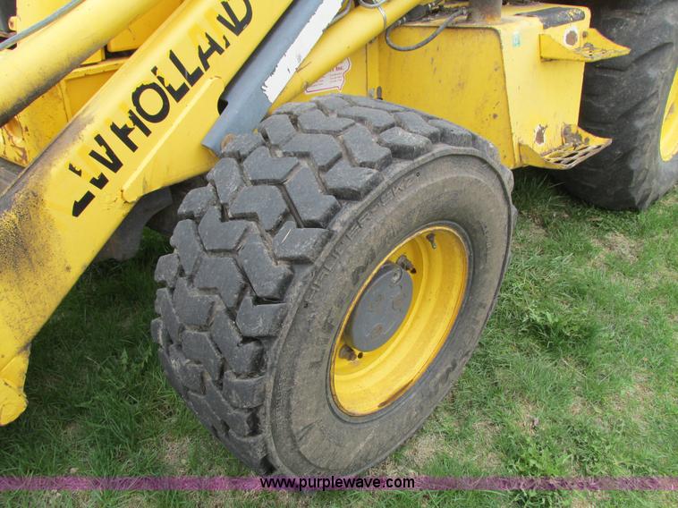 image for item E4713 2000 New Holland 575E backhoe